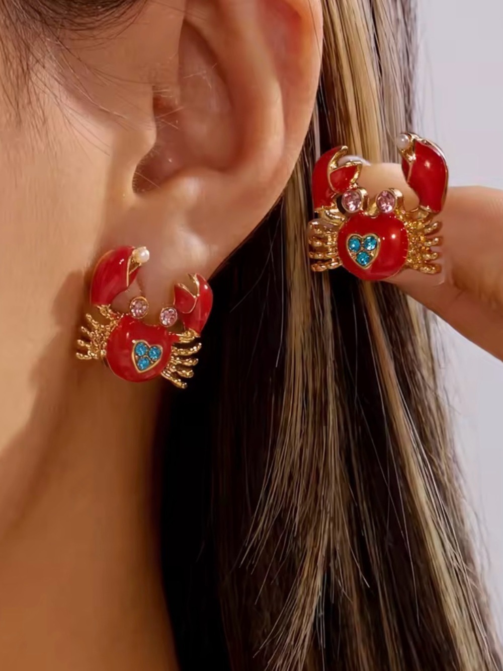 Gold-Tone Red Crab Stud Earrings with Blue Heart Accent